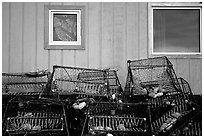 Fishing baskets and wall. Kotzebue, North Western Alaska, USA ( black and white)