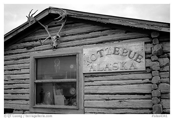 Log cabin with caribou antlers. Kotzebue, North Western Alaska, USA (black and white)