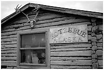 Log cabin with caribou antlers. Kotzebue, North Western Alaska, USA (black and white)