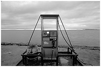 Gas pump on the beach, looking towards the Bering sea. Kotzebue, North Western Alaska, USA ( black and white)