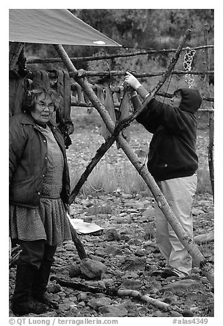 Inupiaq Eskimo women drying fish, Ambler. North Western Alaska, USA (black and white)