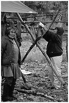 Inupiaq Eskimo women drying fish, Ambler. North Western Alaska, USA (black and white)