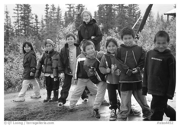 Inupiaq Eskimo kids and teacher, Kiana. North Western Alaska, USA (black and white)