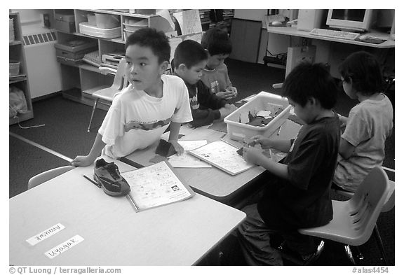 Inupiaq Eskimo kids in the classroom. Note names on table. Kiana. North Western Alaska, USA (black and white)