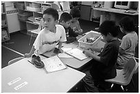 Inupiaq Eskimo kids in the classroom. Note names on table. Kiana. North Western Alaska, USA ( black and white)