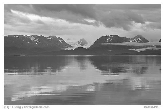 Kenai Mountains reflected in Katchemak Bay. Homer, Alaska, USA (black and white)
