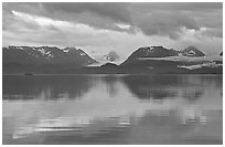 Kenai Mountains reflected in Katchemak Bay. Homer, Alaska, USA ( black and white)