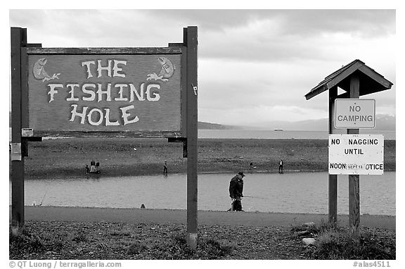 Fishing Hole signs. Homer, Alaska, USA (black and white)
