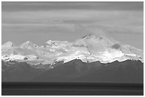 Mt Iliamna, a volcano in Lake Clark National Park, seen across the Cook Inlet. Ninilchik, Alaska, USA (black and white)