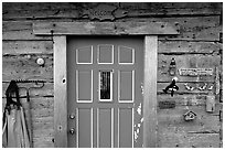 Wooden cabin door. Ninilchik, Alaska, USA (black and white)