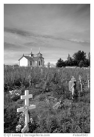 Russian orthodox cemetery and old Russian church. Ninilchik, Alaska, USA (black and white)