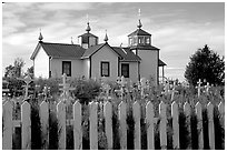 Picket Fence and old Russian church. Ninilchik, Alaska, USA (black and white)