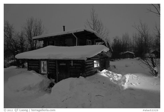 Log cabin at night. Wiseman, Alaska, USA (black and white)