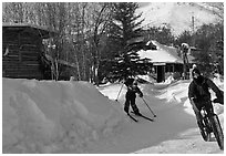 Winter recreation with snow-tired bike and skis. Wiseman, Alaska, USA (black and white)