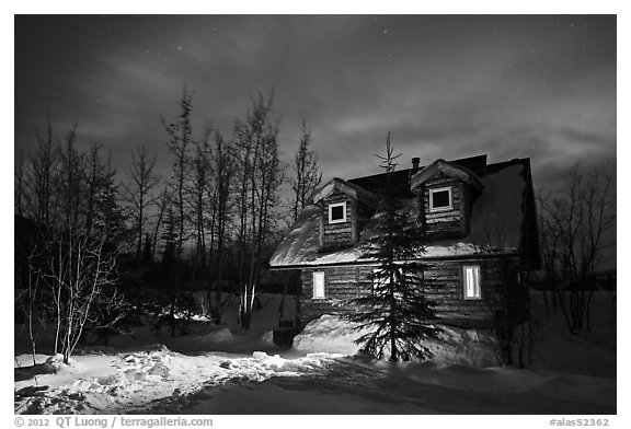 Cabin at night with Aurora Borealis. Wiseman, Alaska, USA (black and white)