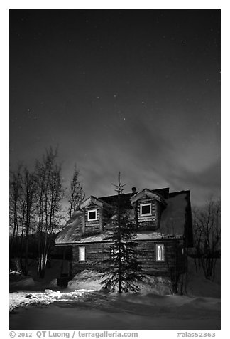 Cabin at night with Northern Lights. Wiseman, Alaska, USA (black and white)