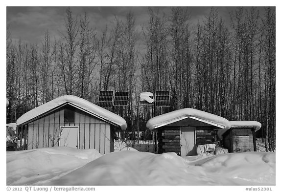 Cabins and solar panels. Wiseman, Alaska, USA (black and white)