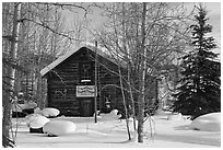 Storebuilding in winter. Wiseman, Alaska, USA ( black and white)