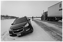 Car stuck in snow along Dalton Highway. Alaska, USA ( black and white)