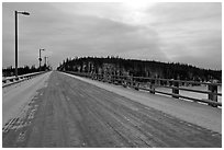 Long wooden bridge across Yukon River. Alaska, USA ( black and white)