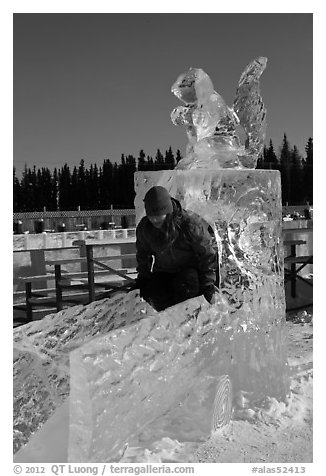 Girl on ice sculpture, George Horner Ice Park. Fairbanks, Alaska, USA (black and white)