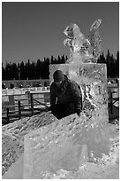 Girl on ice sculpture, George Horner Ice Park. Fairbanks, Alaska, USA ( black and white)