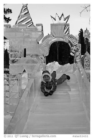 Girl on ice slide, Ice Alaska. Fairbanks, Alaska, USA (black and white)