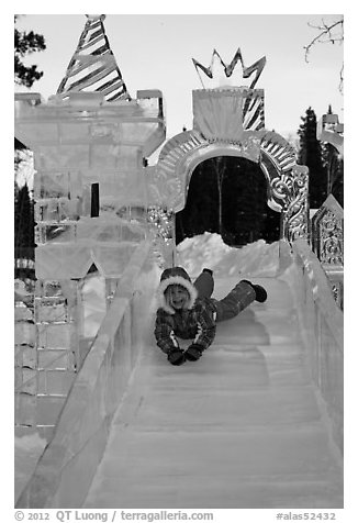 Girl on ice slide, Ice Alaska. Fairbanks, Alaska, USA