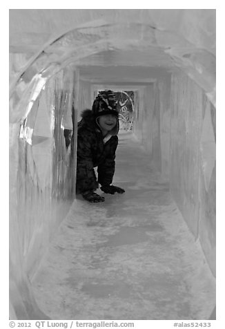 Girl inside ice tunnel, Ice Alaska. Fairbanks, Alaska, USA (black and white)