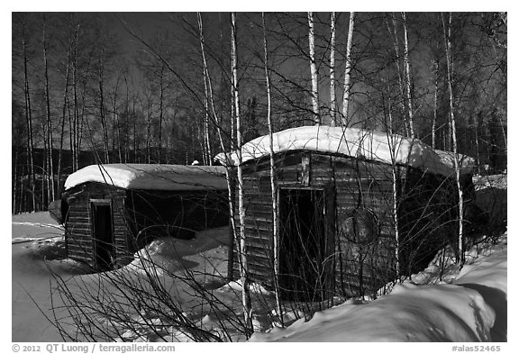 Cabins with gold dredging equipment, Chatanika. Alaska, USA (black and white)