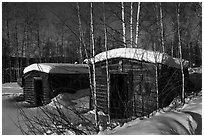 Cabins with gold dredging equipment, Chatanika. Alaska, USA (black and white)