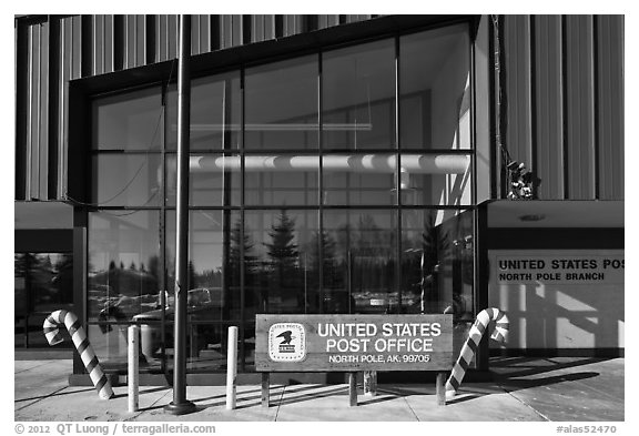 Post office sign with candy stripped canes. North Pole, Alaska, USA