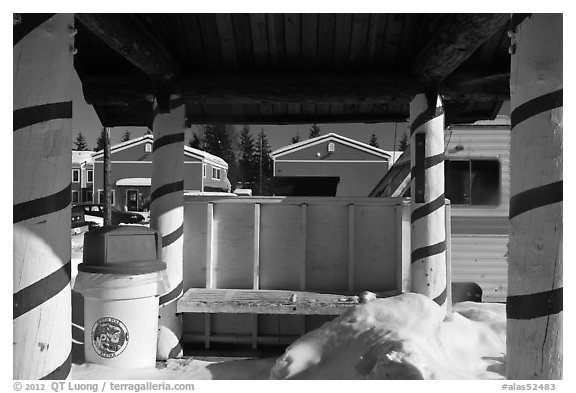 Bus stop with red candy-like stripped columns. North Pole, Alaska, USA