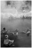 People with frozen hair relaxing in hot springs. Chena Hot Springs, Alaska, USA (black and white)