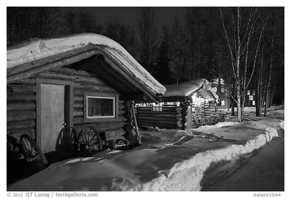 Cabins at night in winter. Chena Hot Springs, Alaska, USA (black and white)