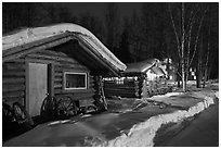 Cabins at night in winter. Chena Hot Springs, Alaska, USA (black and white)