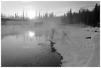 Pond of warm water at sunrise. Chena Hot Springs, Alaska, USA (black and white)