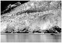 Boat at the base of Barry Glacier. Prince William Sound, Alaska, USA (black and white)