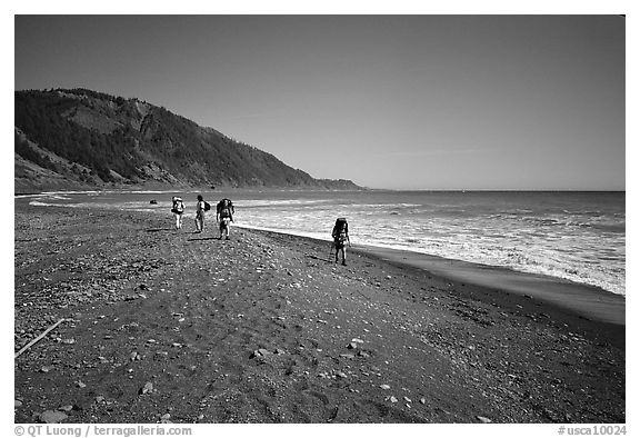 Backpacking on black sand beach, Lost Coast. California, USA