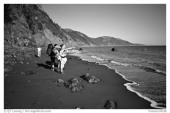 Backpackers on the beach,  Lost Coast. California, USA