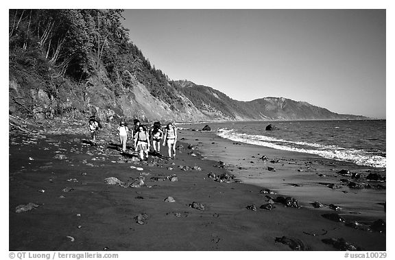 Backpackers on the beach,  Lost Coast. California, USA