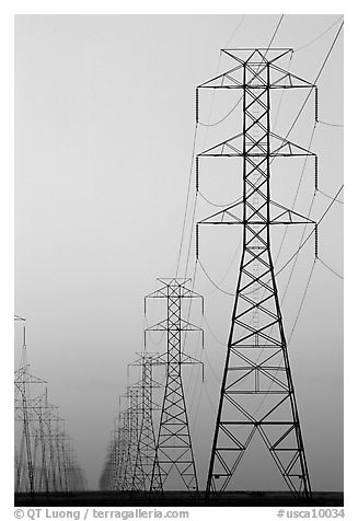 High tension power lines at dusk. California, USA