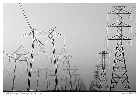 High voltage power lines at dusk. California, USA (black and white)