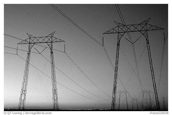 High tension power lines at sunset. California, USA