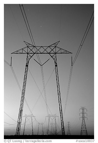 High voltage power lines at sunset. California, USA (black and white)