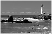 Pigeon Point Lighthouse and rocks, morning. San Mateo County, California, USA (black and white)