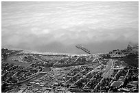 Aerial view of Santa Cruz with fog-covered ocean. Santa Cruz, California, USA (black and white)