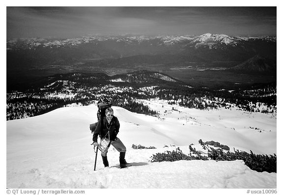 Climber takes a break on the Green Ridge of Mt Shasta. California, USA