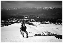 Climber takes a break on the Green Ridge of Mt Shasta. California, USA (black and white)
