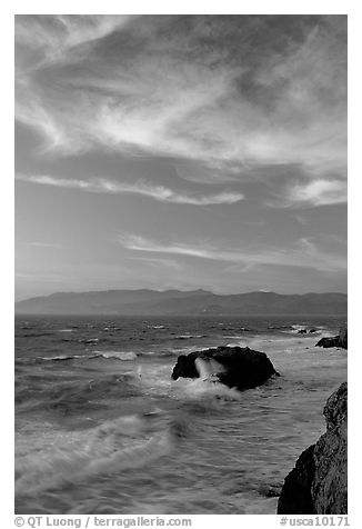 Surf and rocks at sunset seen from the Cliff House. San Francisco, California, USA